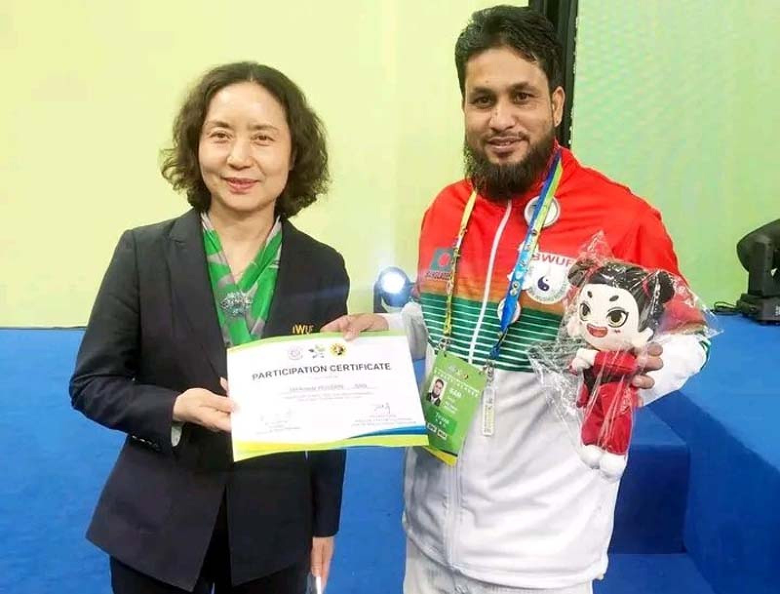 চীনে ওয়ার্ল্ড জুনিয়র উশু চ্যাম্পিয়নশিপে কোচ হিসেবে আনোয়ারের অংশগ্রহণ সনদ অর্জন