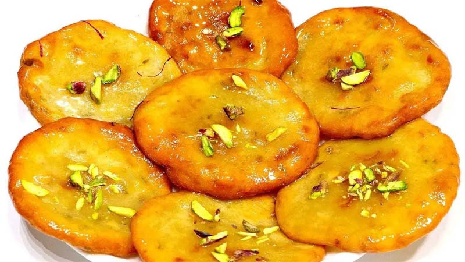 পাকা আমের পোয়া পিঠা তৈরির রেসিপি, জেনে নিন